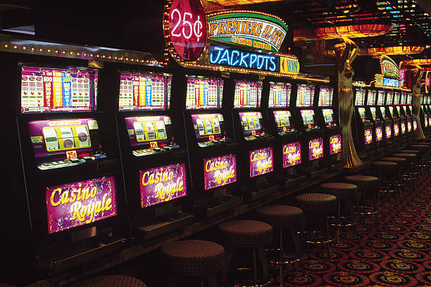 Spadegaming slot reels displayed on a mobile phone inside ini188 login